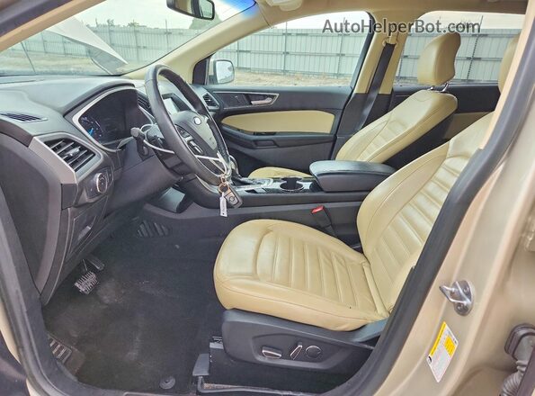 2FMPK3J90HBB45357 2017 FORD EDGE Gold Вид салону спереду