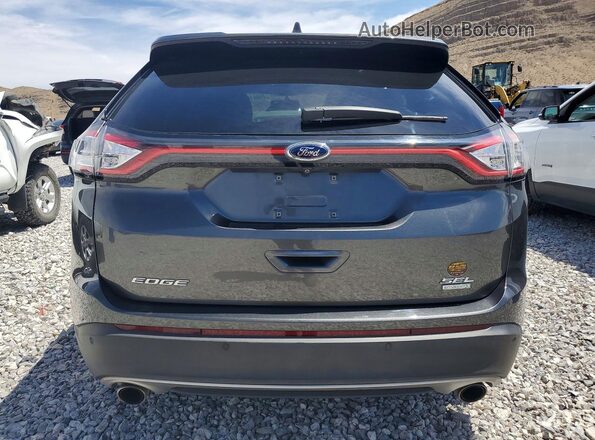 2FMPK3J94HBB43742 2017 FORD EDGE Gray Vista trasera