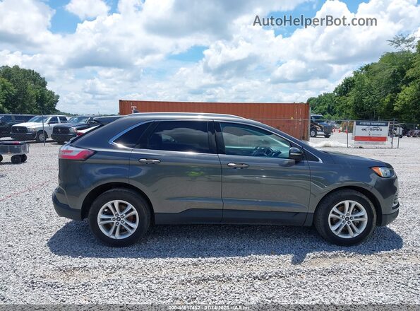 2FMPK3J94KBB73699 2019 FORD EDGE Silver Widok wnętrza z tyłu