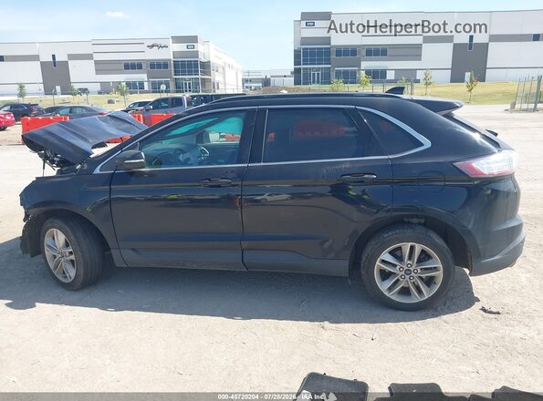2FMPK3J95HBC44014 2017 FORD EDGE Black Սալոնի հետևի տեսք