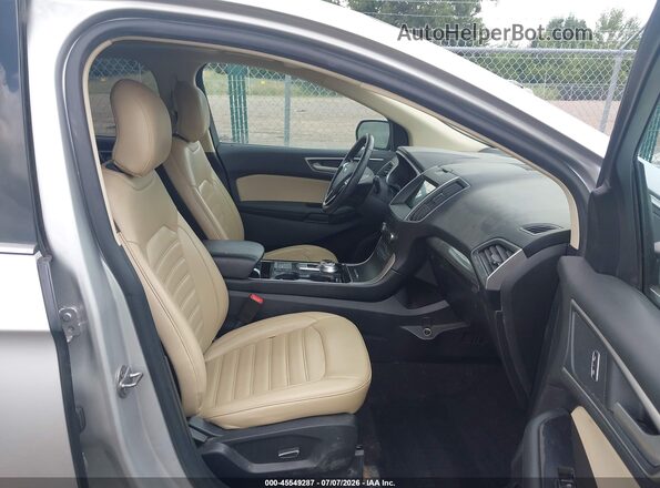 2FMPK3J95KBB81455 2019 FORD EDGE Серебряный Вид салона спереди