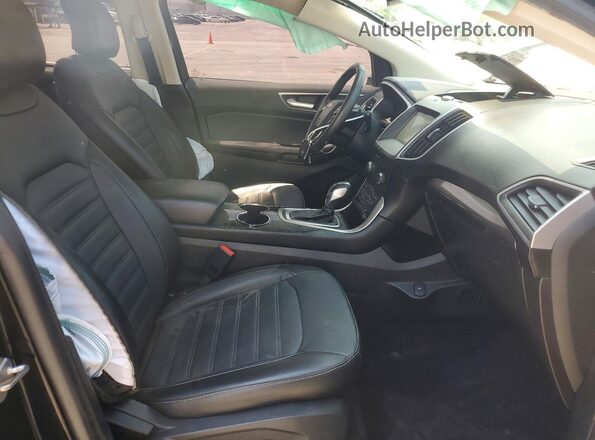 2FMPK3J99JBB39370 2018 FORD EDGE Черный Вид салона спереди