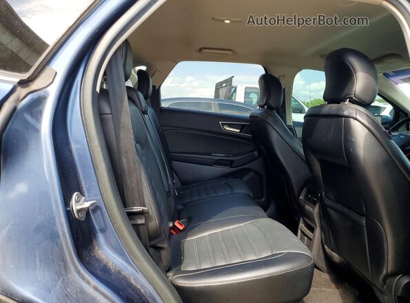 2FMPK3J9XJBC15355 2018 FORD EDGE Blue Widok wnętrza z tyłu
