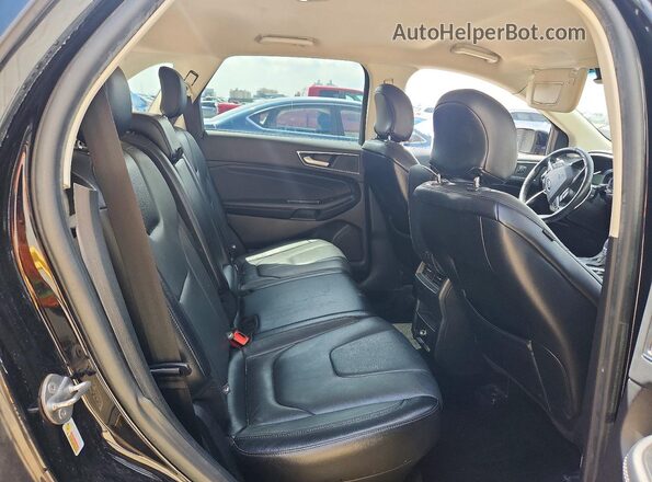 2FMPK3K92JBB75254 2018 FORD EDGE Черный Вид задней части салона