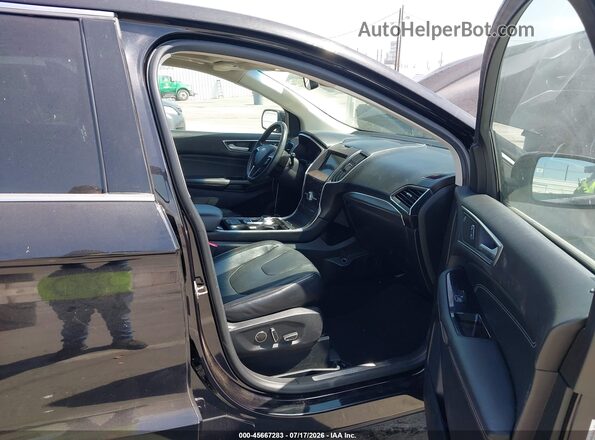 2FMPK3K92KBC37348 2019 FORD EDGE Черный Вид салона спереди