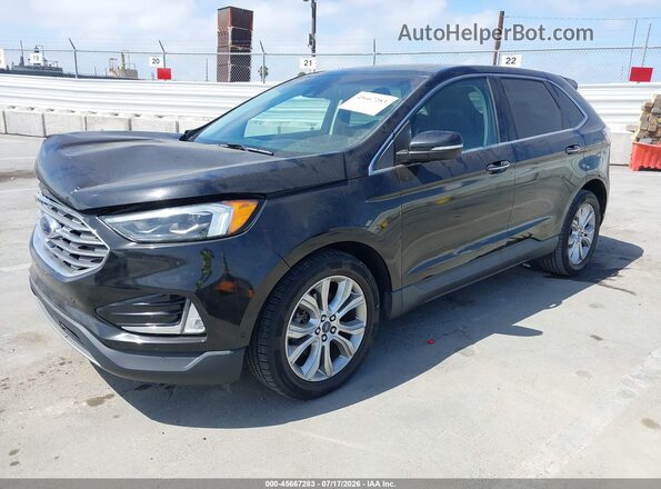 2FMPK3K92KBC37348 2019 FORD EDGE Черный Передняя левая четверть