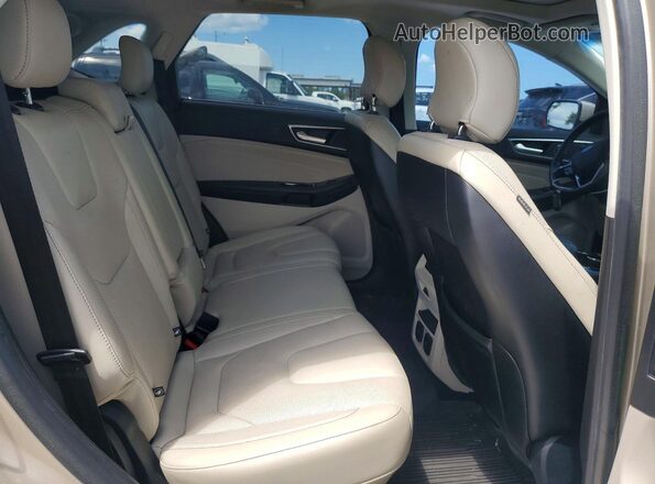 2FMPK3K94HBB55047 2017 FORD EDGE Gold უკანა სალონის ხედი