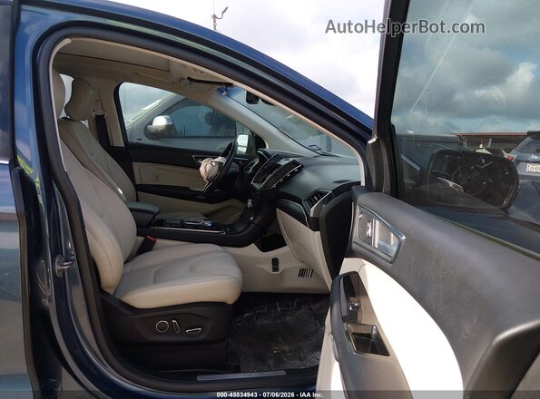 2FMPK3K94KBB49045 2019 FORD EDGE Blue Vista interior delantera