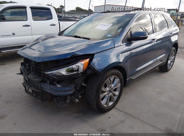 2FMPK3K94KBB49045 2019 FORD EDGE Blue Vista tres cuartos delantera izquierda