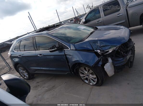 2FMPK3K94KBB49045 2019 FORD EDGE Blue Vista interior trasera