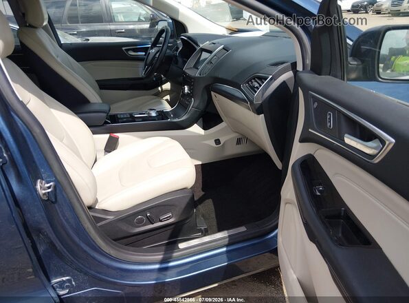2FMPK3K97KBB93265 2019 FORD EDGE Blue Vista interior delantera