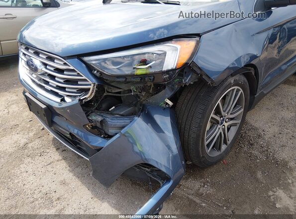 2FMPK3K97KBB93265 2019 FORD EDGE Blue Vista frontal