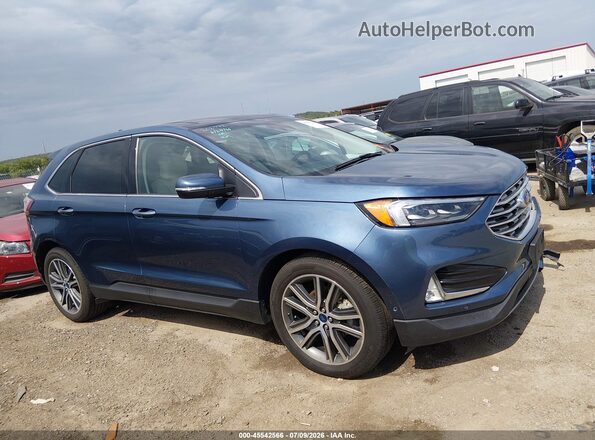 2FMPK3K97KBB93265 2019 FORD EDGE Blue Vista interior trasera