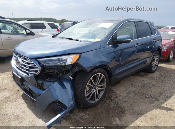 2FMPK3K97KBB93265 2019 FORD EDGE Blue Vista tres cuartos delantera izquierda