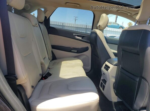 2FMPK3K98KBC02698 2019 FORD EDGE Black Vista interior trasera