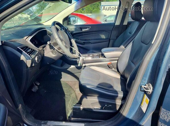 2FMPK3K99KBC10275 2019 FORD EDGE Blue Widok wnętrza z przodu