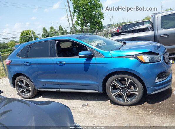 2FMPK4AP2KBB92725 2019 FORD EDGE Синий Вид задней части салона