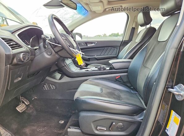 2FMPK4AP4HBC14832 2017 FORD EDGE Черный Вид салона спереди