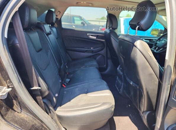 2FMPK4AP6GBB56110 2016 FORD EDGE Black Вид задньої частини салону