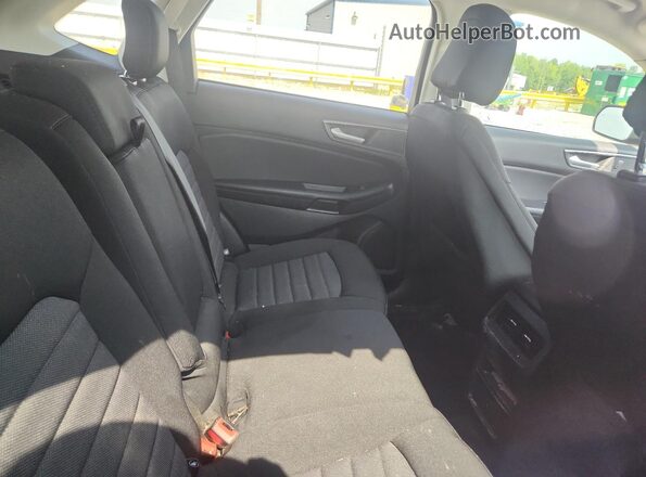 2FMPK4G9XRBA55163 2024 FORD EDGE Gray Vista interior trasera