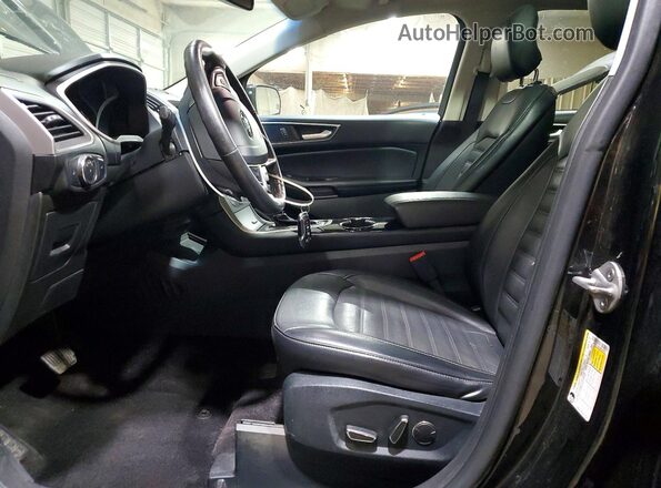 2FMPK4J83GBC64905 2016 FORD EDGE Black Front interior view