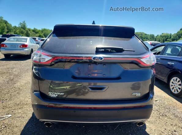 2FMPK4J83HBC06732 2017 FORD EDGE Gray Vista trasera