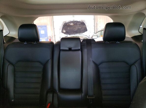 2FMPK4J84HBB69898 2017 FORD EDGE Tan Rear seats view