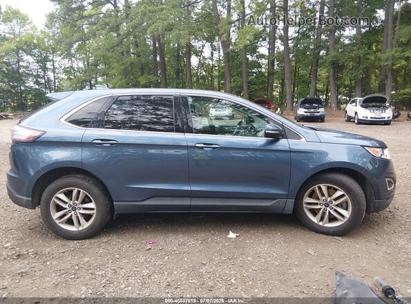 2FMPK4J86JBB69925 2018 FORD EDGE Blue Սալոնի հետևի տեսք