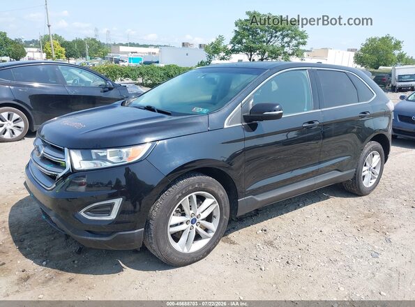 2FMPK4J87HBC58252 2017 FORD EDGE Black Front left