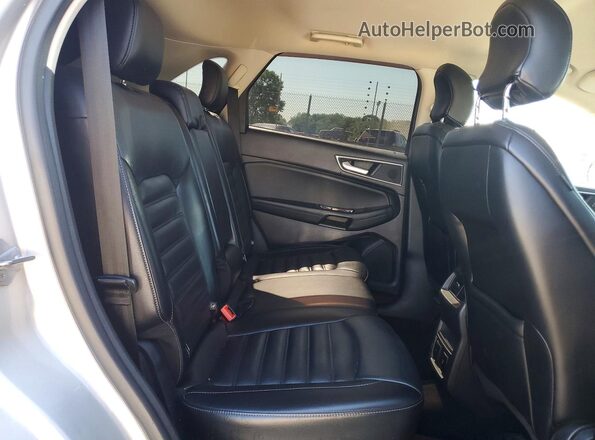 2FMPK4J88HBC29052 2017 FORD EDGE Silver Вид задньої частини салону