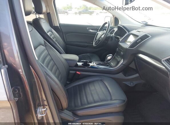 2FMPK4J90HBB38169 2017 FORD EDGE Gray Front interior view