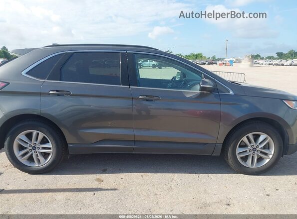 2FMPK4J90HBB38169 2017 FORD EDGE Gray Rear interior view