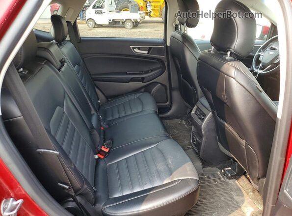 2FMPK4J90JBB92240 2018 FORD EDGE Red Rear seats view
