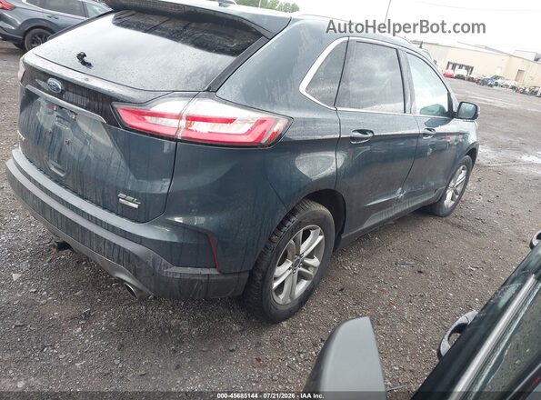 2FMPK4J90KBB86259 2019 FORD EDGE Blue Trasero derecho