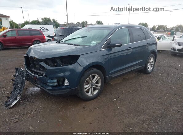 2FMPK4J90KBB86259 2019 FORD EDGE Blue Vista tres cuartos delantera izquierda