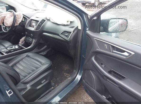 2FMPK4J90KBB86259 2019 FORD EDGE Blue Vista interior delantera