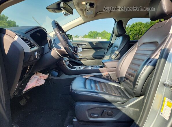 2FMPK4J90RBA71185 2024 FORD EDGE Silver Вид салону спереду