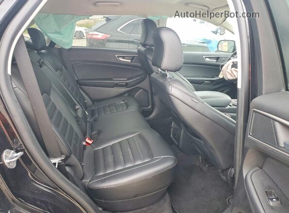 2FMPK4J90RBA72062 2024 FORD EDGE Черный Вид задней части салона