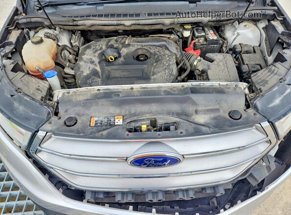 2FMPK4J91HBB25088 2017 FORD EDGE Silver Widok wnętrza z tyłu