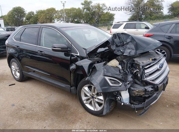 2FMPK4J91HBB26211 2017 FORD EDGE Black Front view