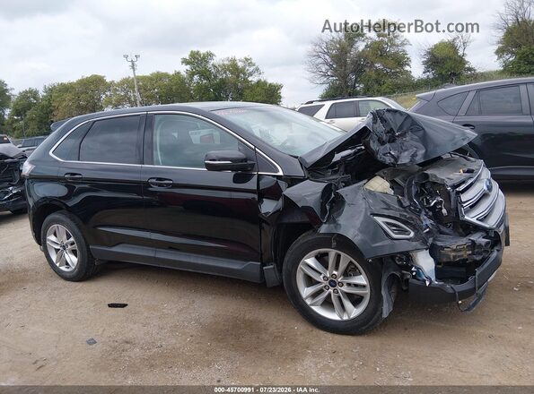 2FMPK4J91HBB26211 2017 FORD EDGE Black Rear interior view