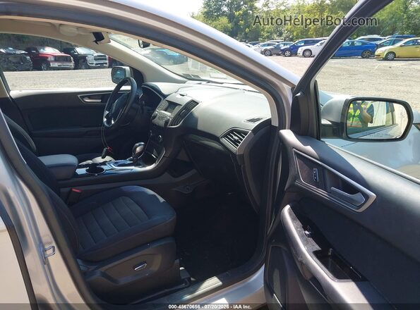 2FMPK4J91JBB78413 2018 FORD EDGE Серебряный Вид салона спереди