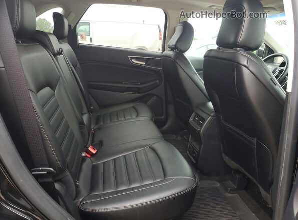 2FMPK4J91LBA17983 2020 FORD EDGE Черный Вид задней части салона