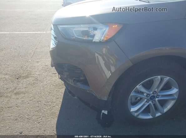2FMPK4J92KBC21416 2019 FORD EDGE Brown Front view