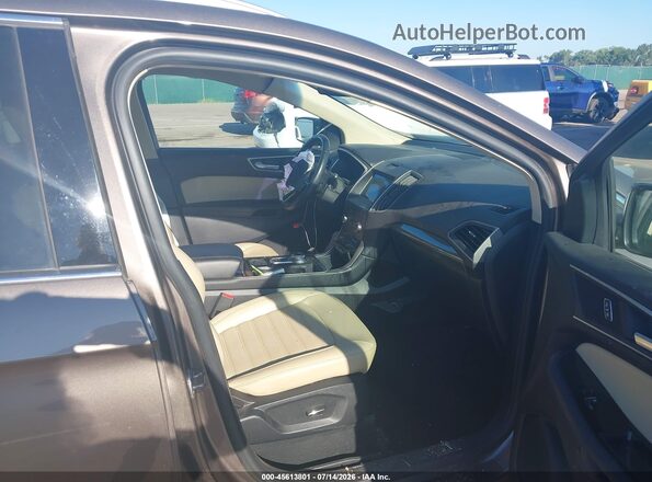 2FMPK4J92KBC21416 2019 FORD EDGE Brown Front interior view