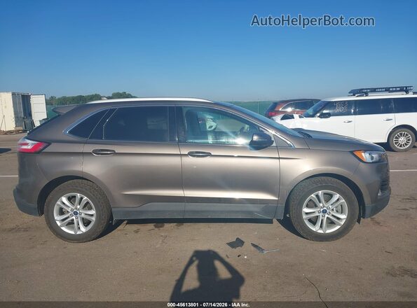 2FMPK4J92KBC21416 2019 FORD EDGE Brown Rear interior view