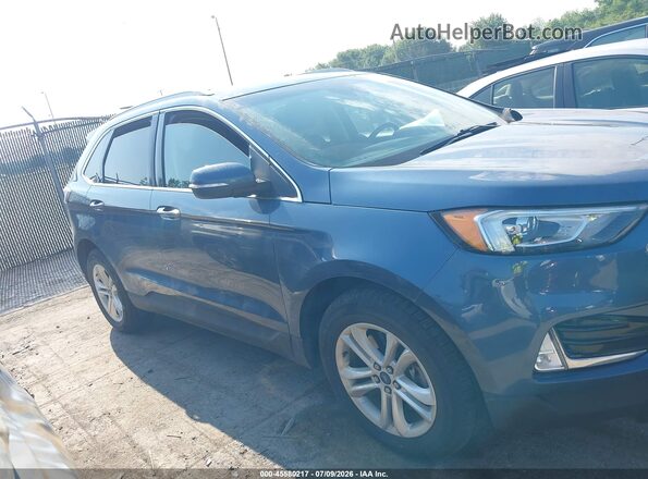 2FMPK4J92KBC33484 2019 FORD EDGE Blue Вид задньої частини салону