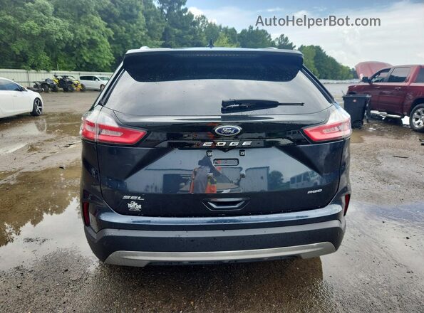 2FMPK4J92RBA44988 2024 FORD EDGE Blue Widok z tyłu