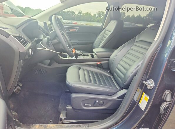 2FMPK4J92RBA44988 2024 FORD EDGE Blue Widok wnętrza z przodu