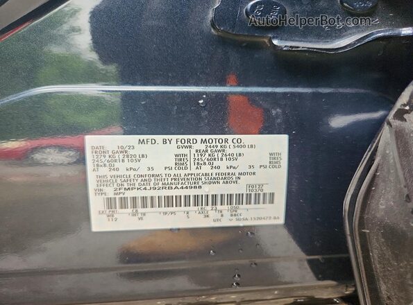 2FMPK4J92RBA44988 2024 FORD EDGE Blue Widok naklejki z numerem VIN